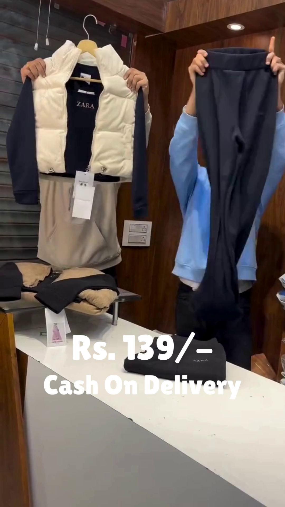 Layered Ember II: Puffer Vest Over Hoodie with Monochrome Motion” 🧥🖤🤎