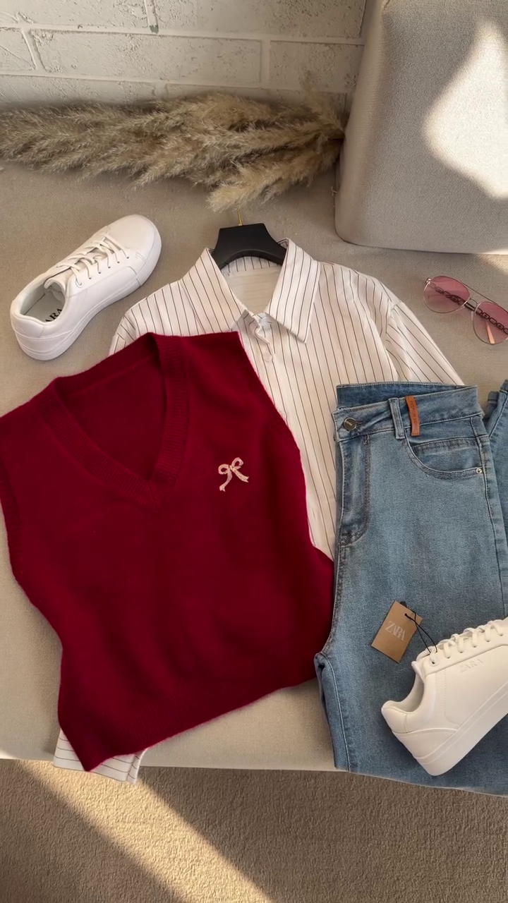 Coordinated Casual Outfit with Striped White Shirt, Maroon Knit Vest, Light Blue Denim Jeans, and White Sneakers 👕👖🧥👟✨