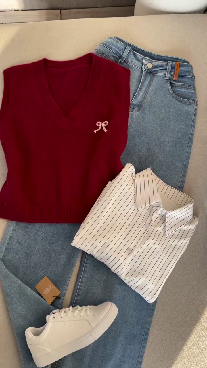 Coordinated Casual Outfit with Striped White Shirt, Maroon Knit Vest, Light Blue Denim Jeans, and White Sneakers 👕👖🧥👟✨