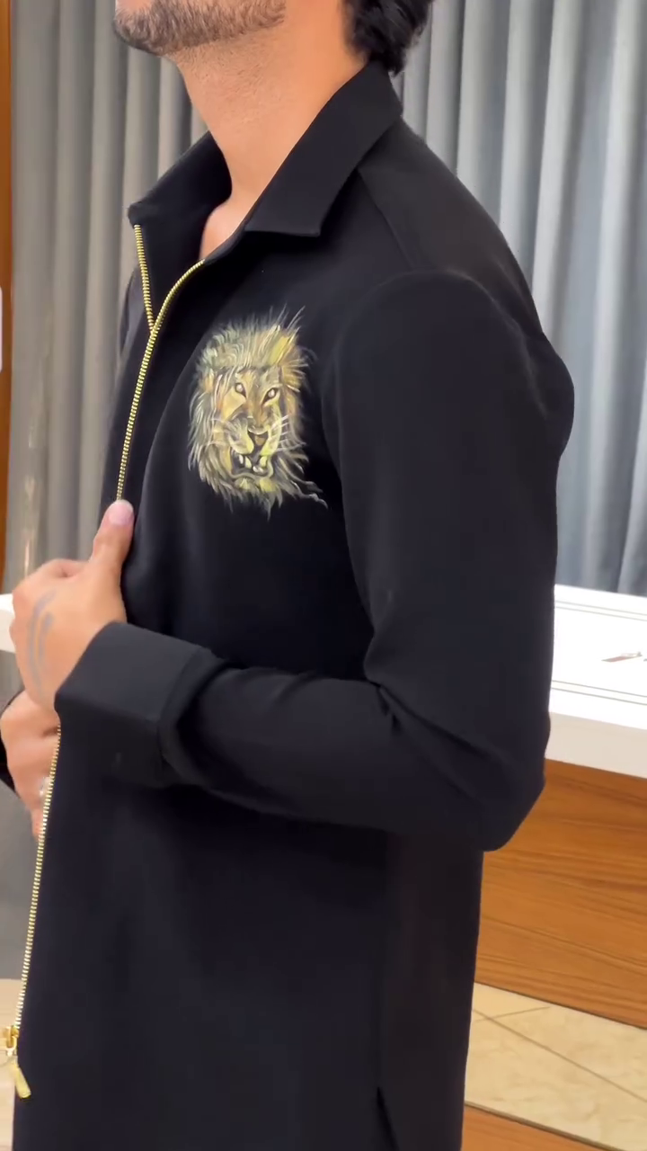 Sleek Black Outfit with Gold Zipper Detailing and Decorative Emblem 👔🖤✨🌟👞