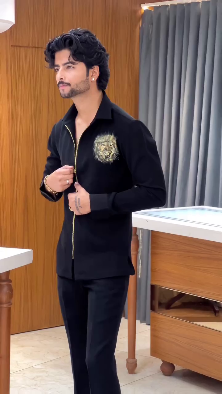 Sleek Black Outfit with Gold Zipper Detailing and Decorative Emblem 👔🖤✨🌟👞