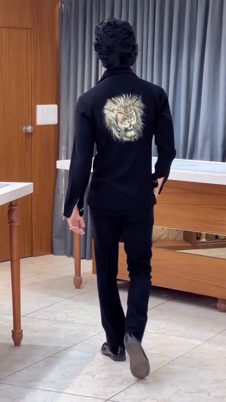 Sleek Black Outfit with Gold Zipper Detailing and Decorative Emblem 👔🖤✨🌟👞