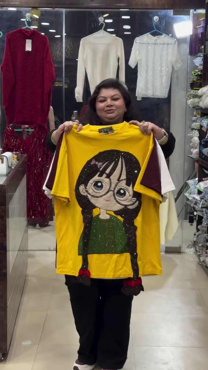 Brown T-Shirt 👕 with Decorative Cartoon Girl Graphic 👧 + 3D Braided Hair 🎀 + Glittery Green Top ✨ Statement Piece