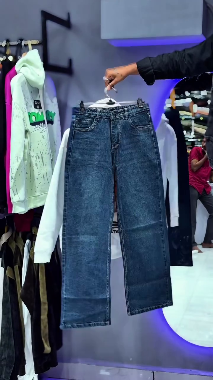 Unisex White Graphic Hoodie with Front Cartoon Print & Kangaroo Pocket – Paired Display with Blue Denim Bottom 👕🧥✨