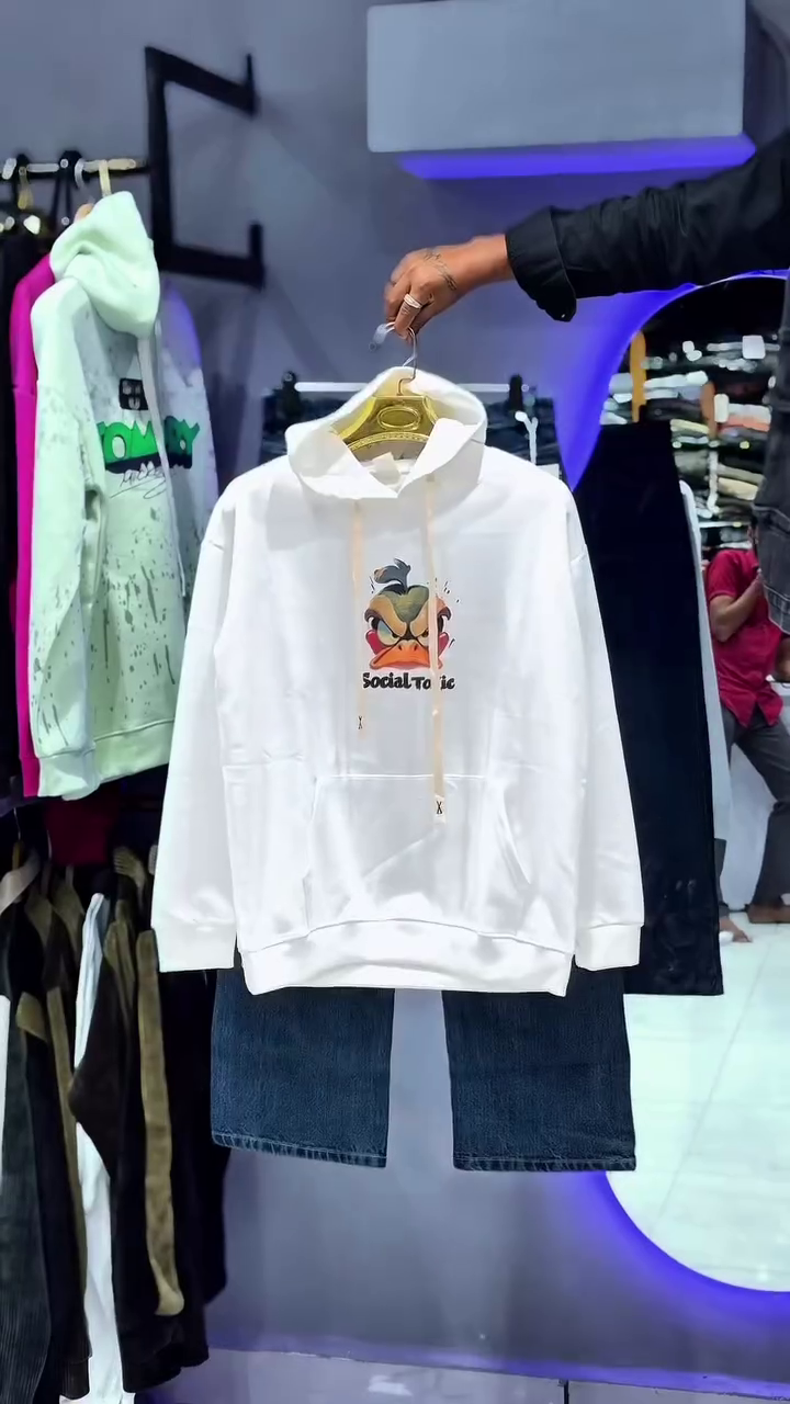 Unisex White Graphic Hoodie with Front Cartoon Print & Kangaroo Pocket – Paired Display with Blue Denim Bottom 👕🧥✨