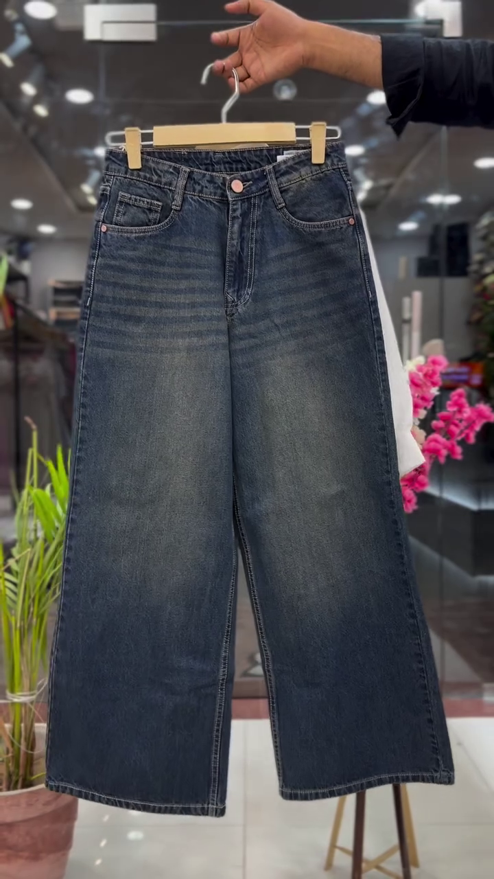 Modern White Cropped Button Down Shirt with Black Script Print Layered Over Inner Top and Dark Blue Wide Leg Denim Set