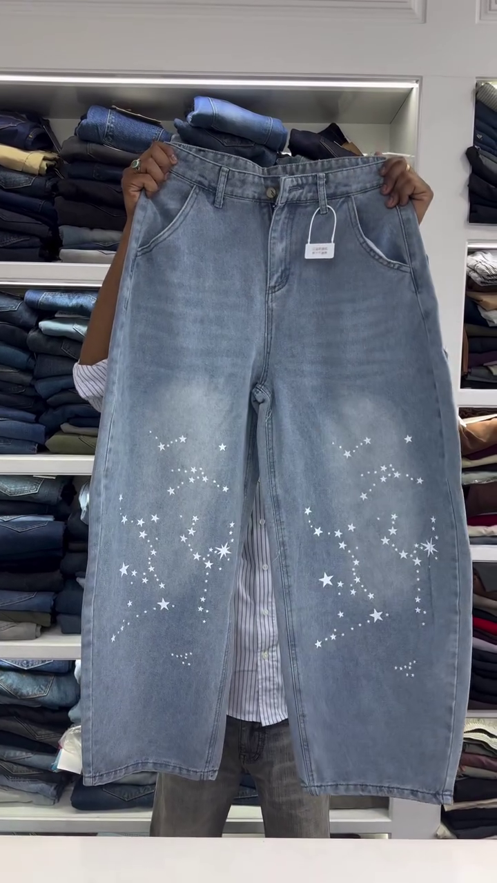 Light Wash High-Rise Wide Leg Denim Jeans with White Star Galaxy Print Pattern and Soft Faded Finish