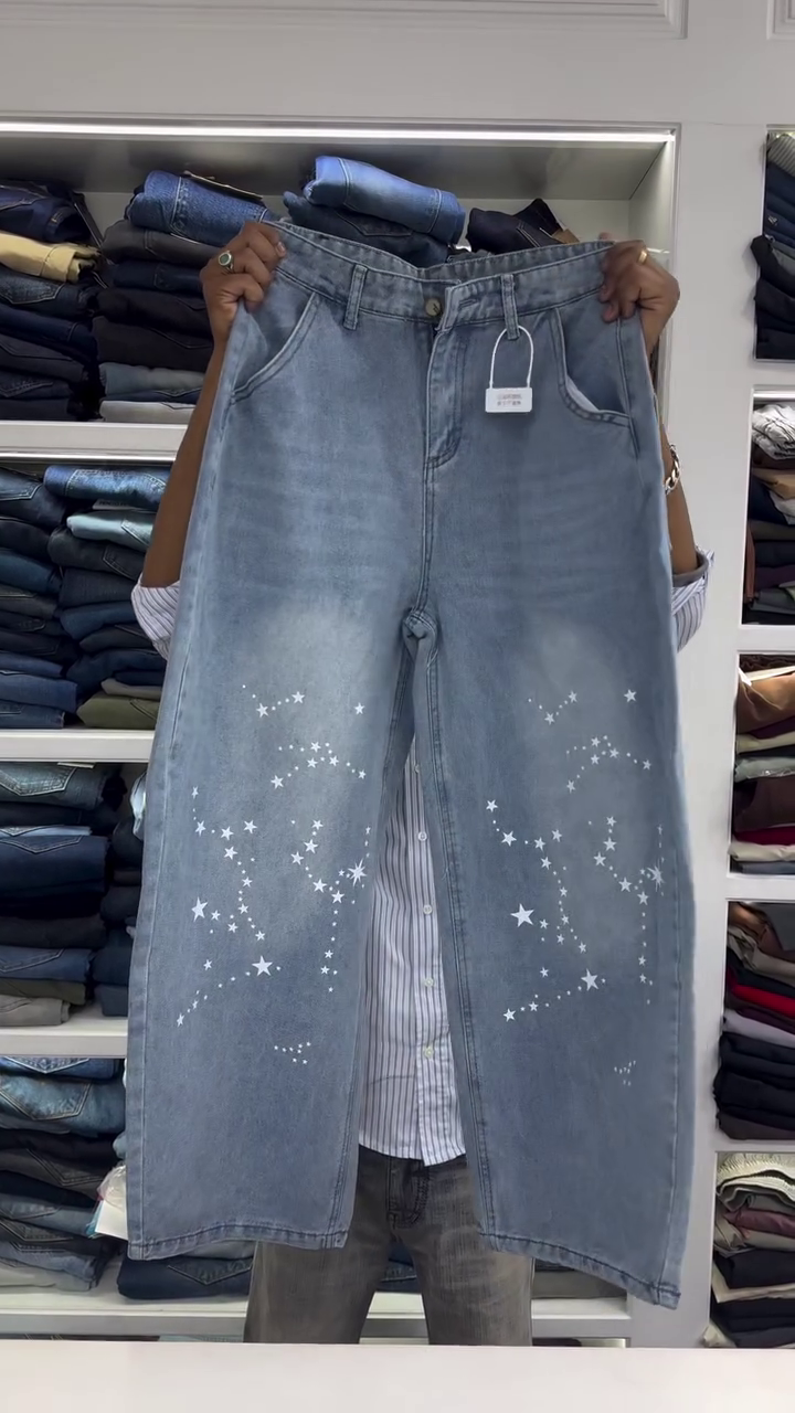 Light Wash High-Rise Wide Leg Denim Jeans with White Star Galaxy Print Pattern and Soft Faded Finish