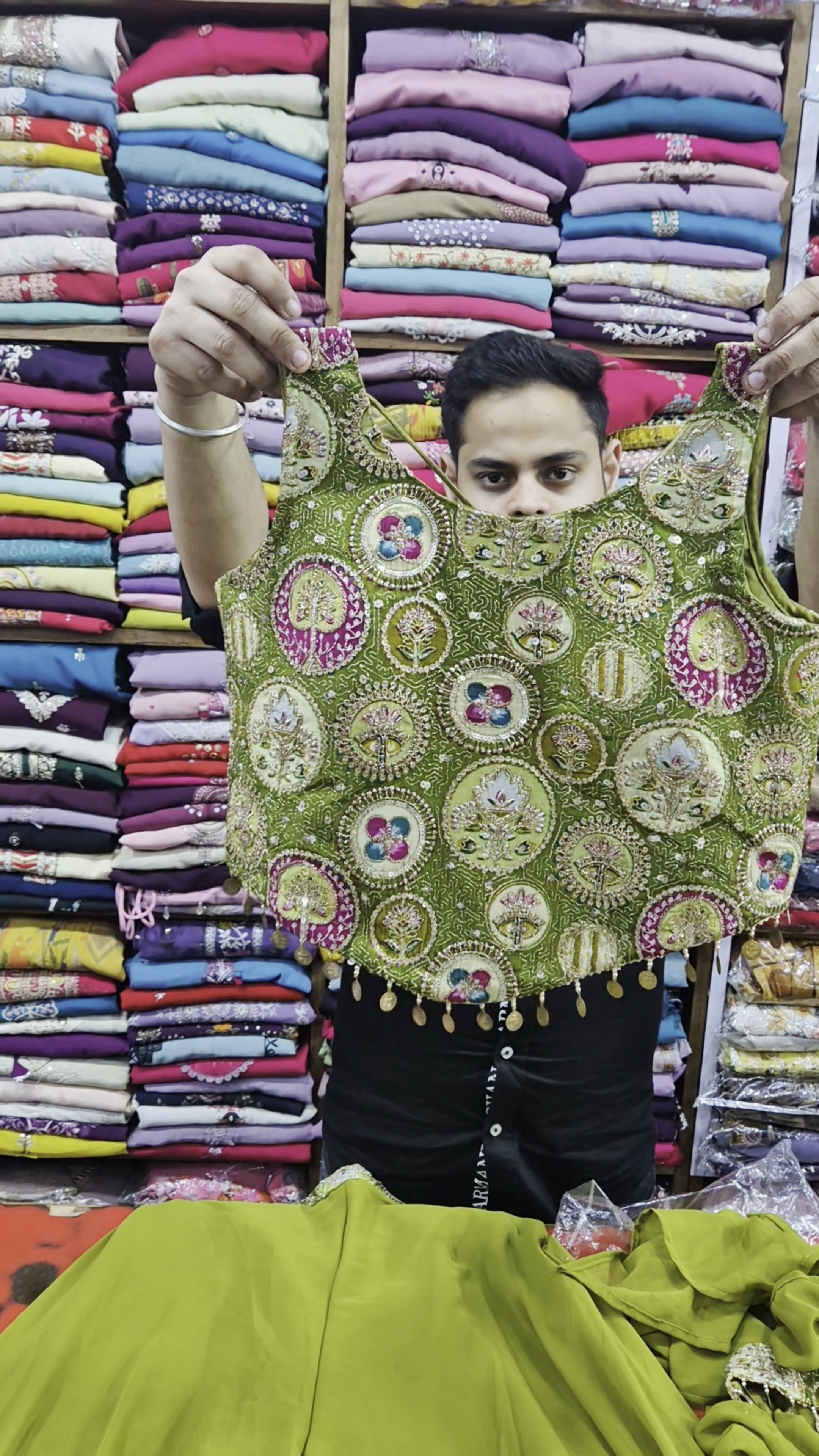 Olive Green Heavy Embroidered Short Kurti with Mirror & Thread Circular Motif Work Paired with Matching Flowy Palazzo Pants and Coordinated Dupatta – Festive Ethnic Three-Piece Set